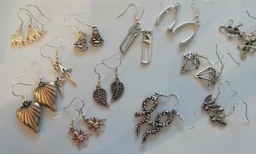 Silvertone earrings pretty - silvertone,